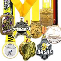 Medallas de oro personalizadas con cinta