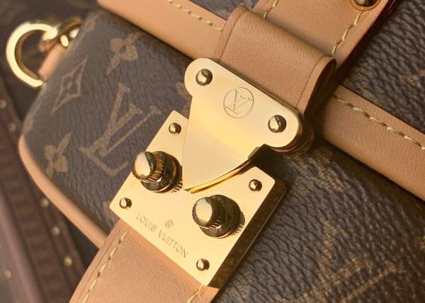 Ladies Leather 7.5cm Circular Push Lock Crossbody Bag With Mental Ornament