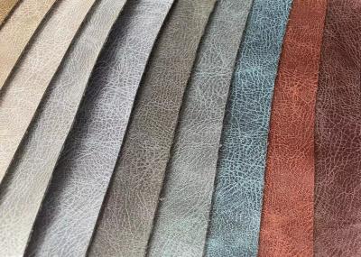 A folha imprimiu a tela da camurça que bronzeia Sofa Knitted Technics