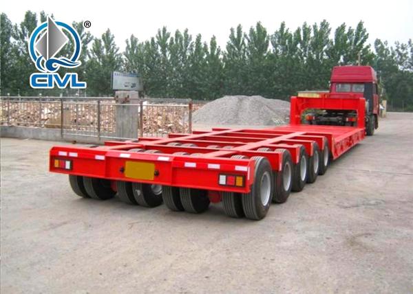 3 Line 6 Axles Fuwa Axles Low Bed 100T Semi Trailer Trucks For Equipment Transportation