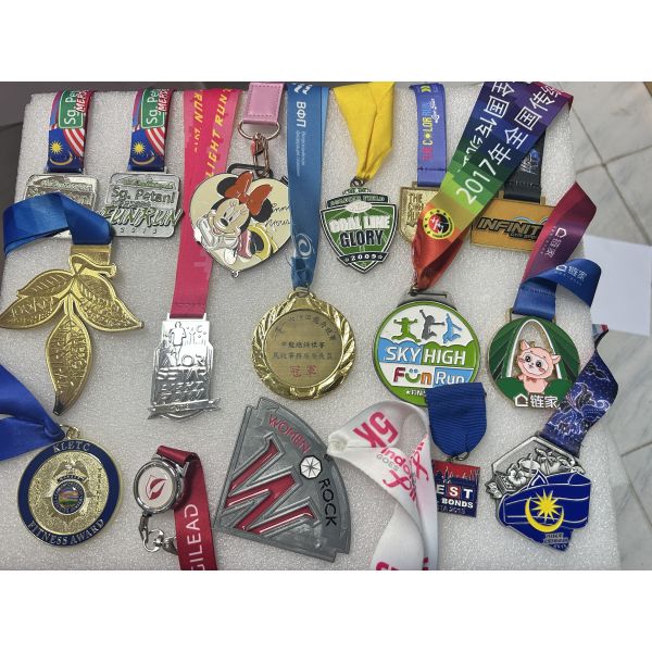 Soft enamel metal medals crafted using die cast process available in gold silver copper and antique finishes for various occasions