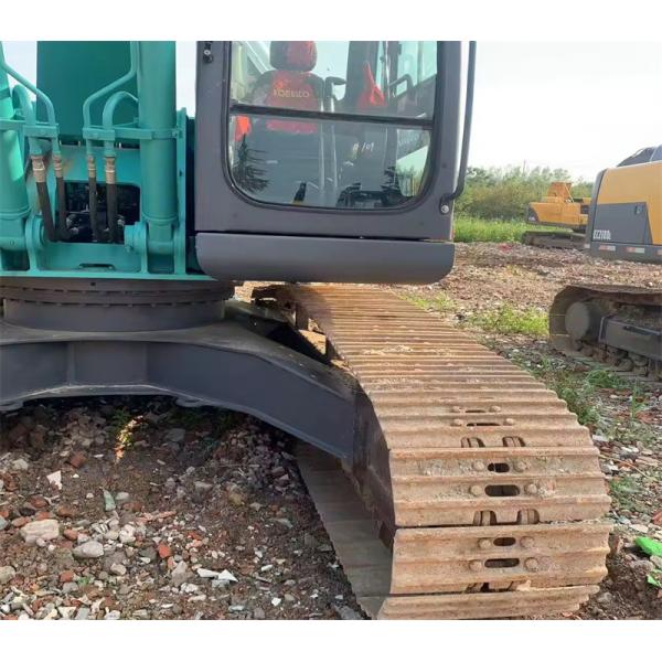 Excavateur Kobelco hydraulique SK210LC vert utilisé
