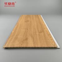 Panneaux muraux en PVC à grains de bois en gros Panneau de plafond en PVC anti rayures pour la décoration résidentielle