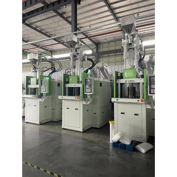 Water Cooling Vertical Injection Molding Machine With 2430Kg/Cm2 Injection
