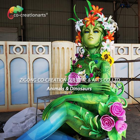 クリスタルエナジーの脚を持つ魅惑的な光る花の妖精彫刻 | 植物ファンタジーライトアート