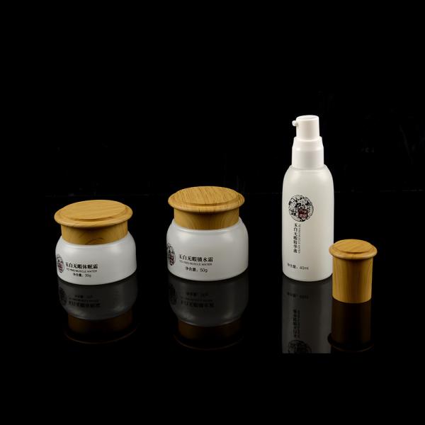 O cosmético de alta qualidade por atacado da forma da bola desnata os frascos que empacotam o cosmético acrílico do frasco do recipiente do creme de Skincare