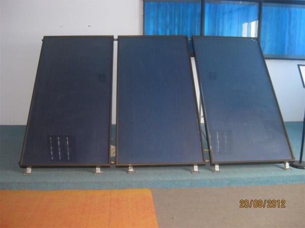 Flat panel solar thermal collector