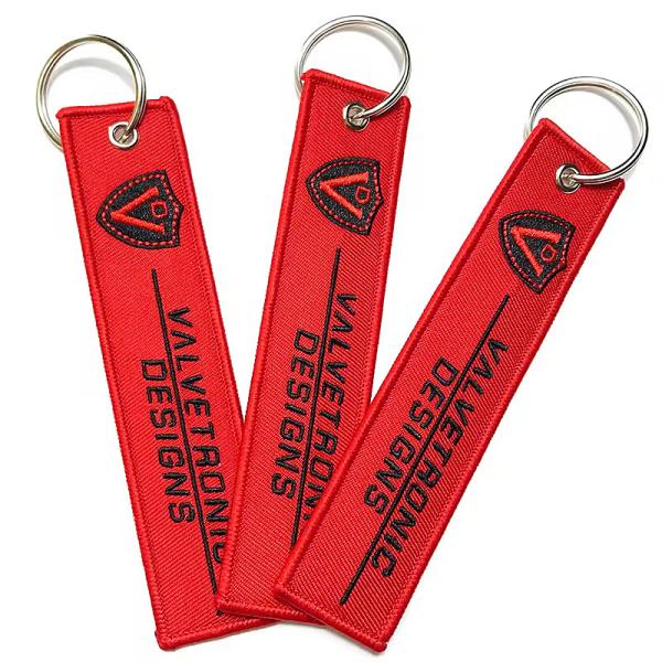 Wholesale Olecranon Hook Cheap Custom Flight Fabric Embroidery Jet Tag Woven Keychain With Your Own Logo