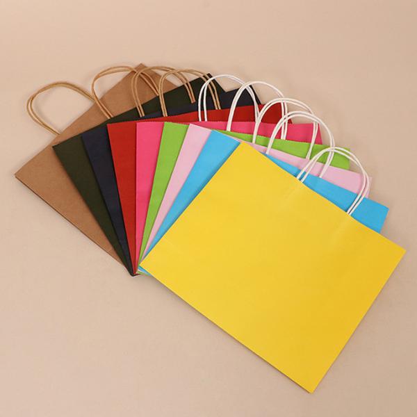 ハンドルが付いている再使用可能なクラフト紙のギフトの包装袋を印刷する注文のロゴ