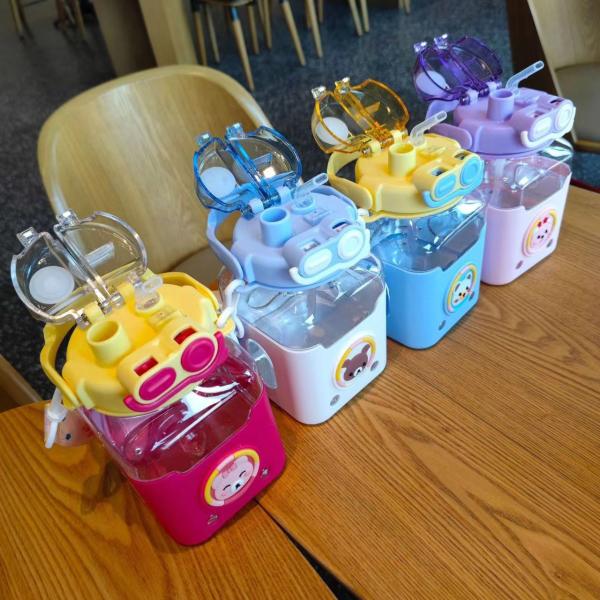 Student Plastic Water Bottle with Handle and Shoulder Strap 980ml Cartoon Design