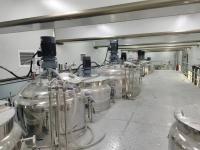 Ligne de production automatique de détergent en acier inoxydable avec capacité de poids personnalisée