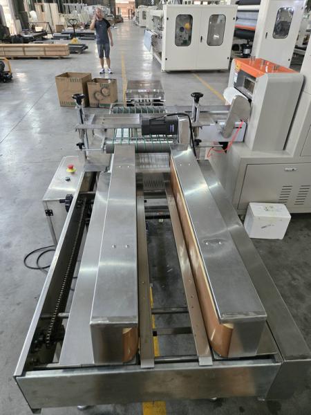 CPP sided heat sealing film automatic small toilet paper roll and kitchen towel paper packing machine price