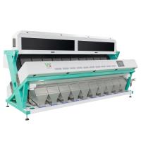 O classificador da cor do pistache de Califórnia faz à máquina as porcas óticas que classificam o equipamento com serviço sem contato