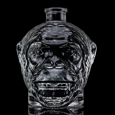 Unique Design 500ml 750ml Monkey Head Shaped Glass Bottle for Vodka Liquor With Cork