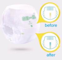 A fralda descartável feita sob encomenda do bebê da marca própria arfa o desempenho absorvente super