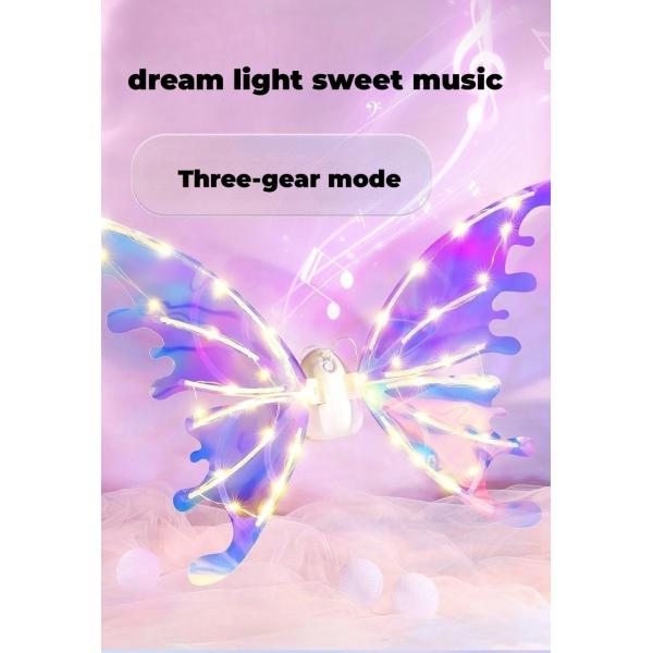 Электрическая бабочка феи подгоняет свет подарков зарева и движения