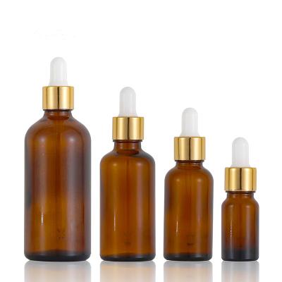 O conta-gotas do óleo essencial do cilindro 100ml engarrafa o revestimento UV