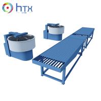 Machine pour la coulée automatique de béton sur mesure, pour le dosage humide, pour la fabrication de blocs de pavé