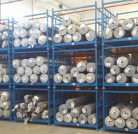 Système de rangement de rouleaux détachables pour tissus métalliques lourds