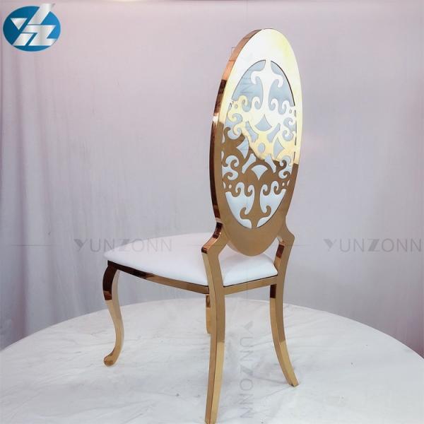 Oro de la venta directa de la fábrica que apila la silla del banquete