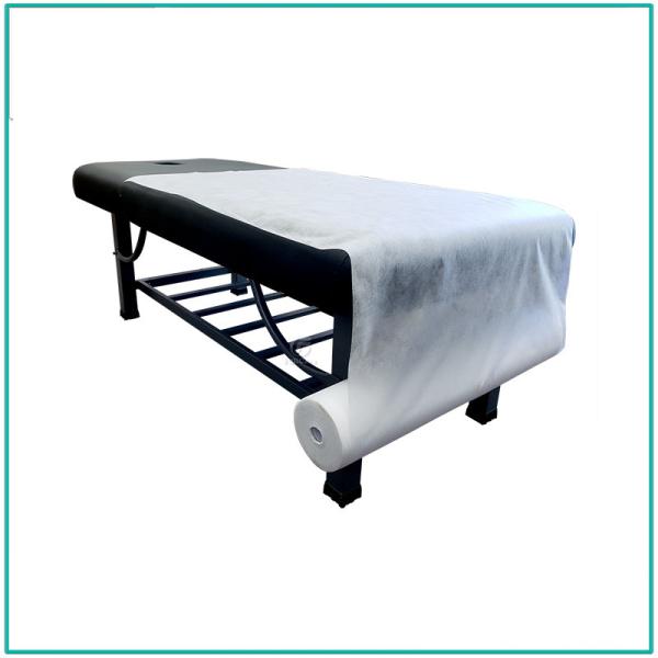 As folhas do SALÃO DE BELEZA 50 dos TERMAS da casa pelo rolo fazem massagens o rolo do papel da cama