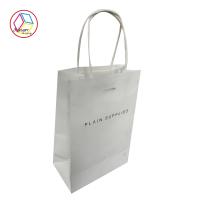 Les sacs en papier imprimés blancs de boutique apprêtent tirage en couleurs de technologie