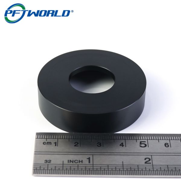 High-precision CNC turning of black Delrin plastic parts 