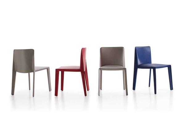 Doyl Hard Fiberglass Dining Chair Modern Simple Saddle Leather Casual