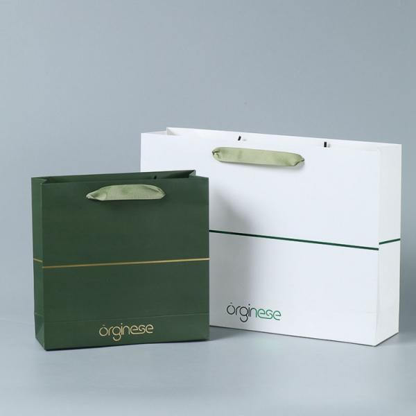Customized Logo Accepted Ivory Board Paper Bags for Boutique Requirement
