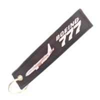 Chaîne de clé d'avion haut de gamme avec double broderie - Design officiel Boeing 777, Souvenir métallique noir/bleu/rouge pour les amateurs d'aviation