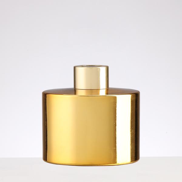 Botella de vidrio personalizada de aromaterapia moderna botella de lujo en forma de aceite de fragancia