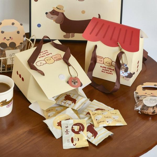 Boîtes cadeaux pour la maison sur le thème des adorables chiens avec rubans et poignées pour cookies, gâteaux et croustilles en forme de flocons de neige