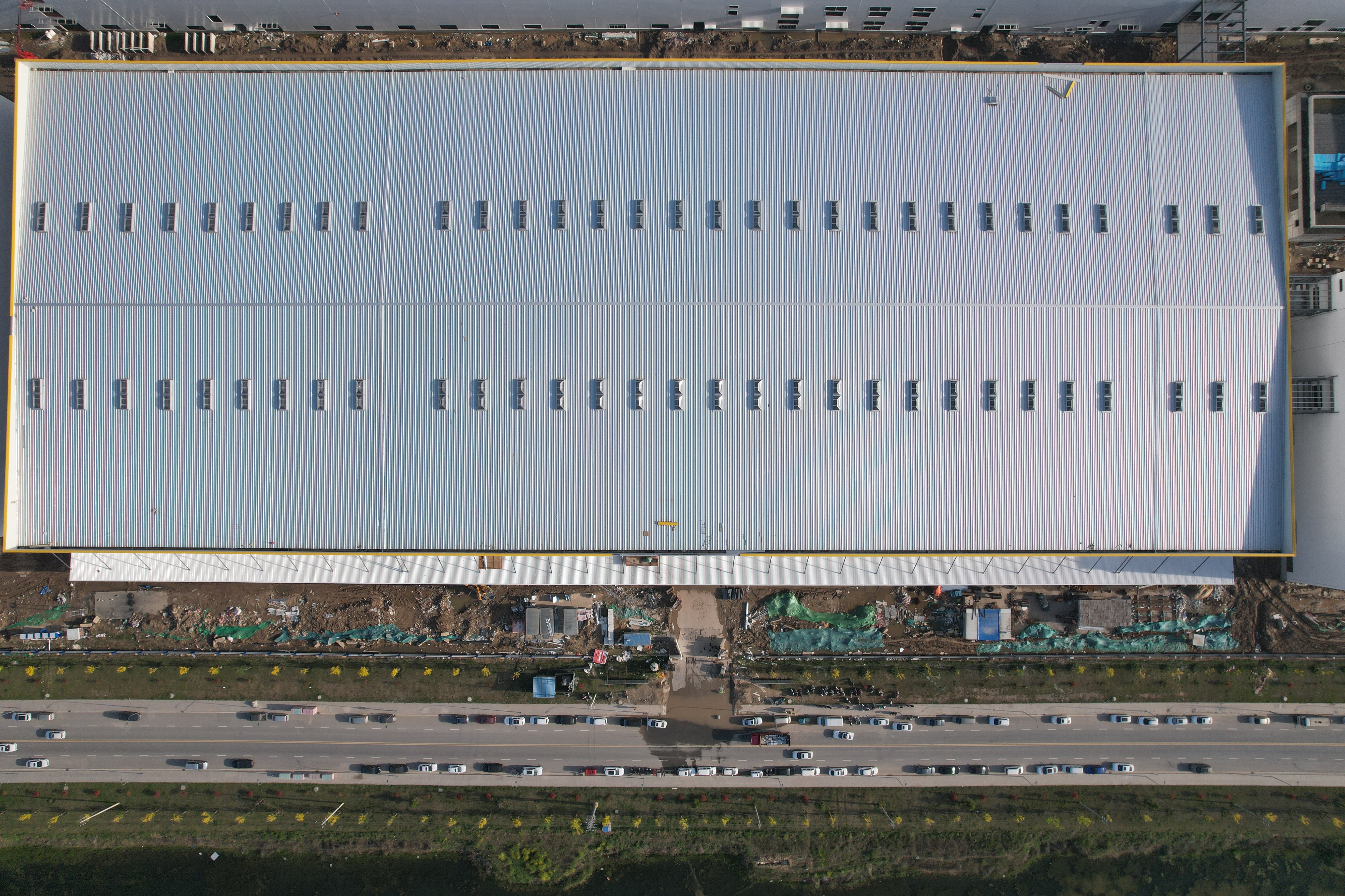 Pre‑manufactured steel frame components field installation factory building food‑processing plant stock warehouse transit logistics station