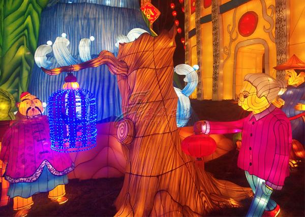 Beautiful Golden Fabric Chinese Lanterns Tree Interacting With Children And Adults