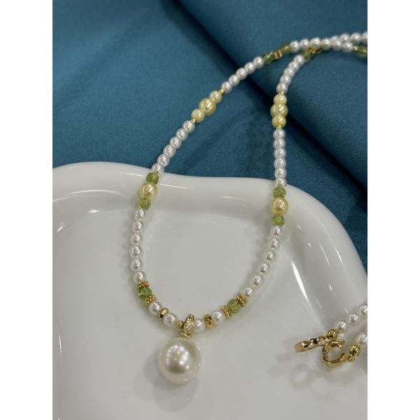 White light color round beads pendant necklace with a pendant size 14 mm and 72 cm chain length designed to add sophistication and charm