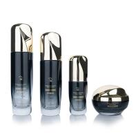 30g/100ml 50g/80g verre Gradient noir et blanc cylindrique Lissé avec couvercle doré pour flacon d'emballage cosmétique