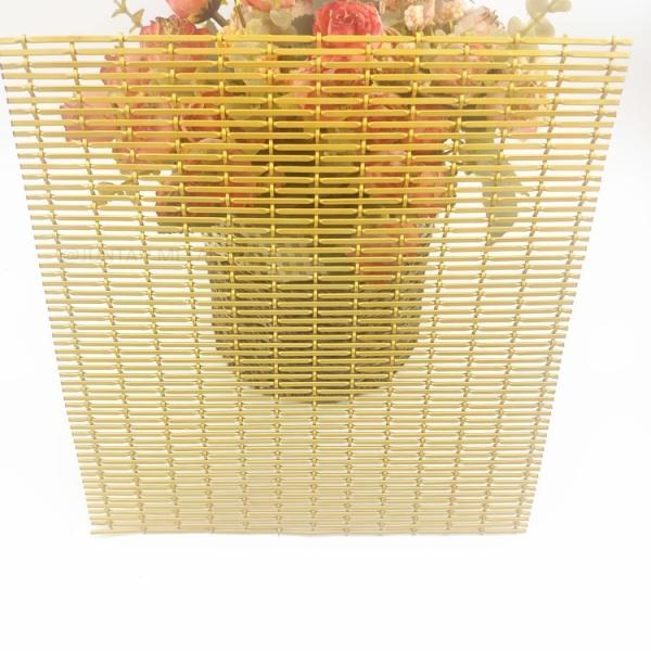 Decorative woven metal mesh for copper clad laminates on the interior walls of hotels
