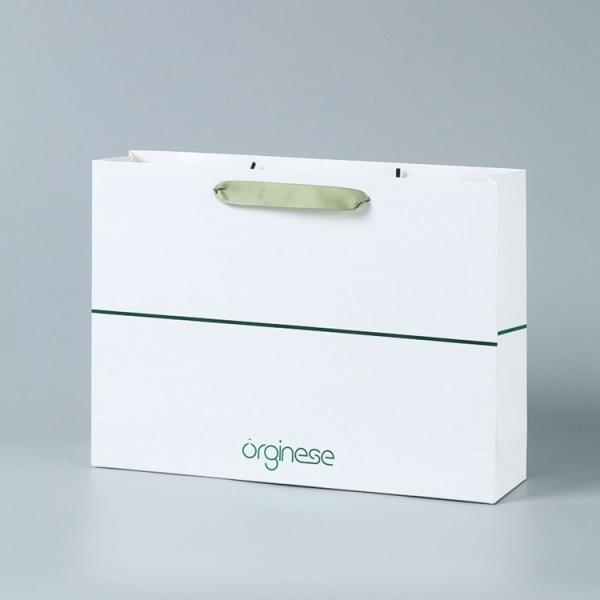 Customized Logo Accepted Ivory Board Paper Bags for Boutique Requirement