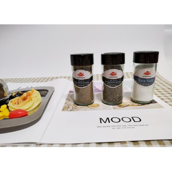 Jarrones redondos de vidrio de plástico con tapa giratoria para artículos esenciales de cocina