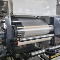 Machine de laminage de colle à fusion chaude pour matériau thermique isolant
