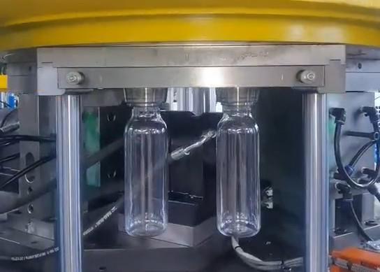 3800bph Semi Automatic Pet Blowing Plastic Bottle Production Machine 10 CAV 100ml