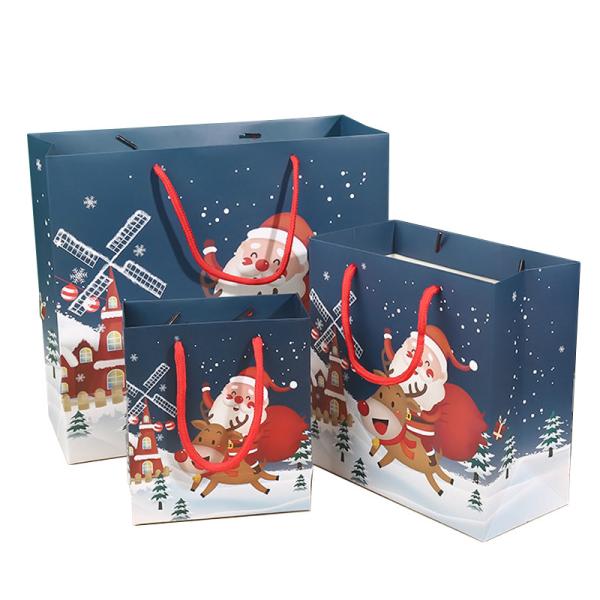 Sacos de presente de papel de Natal duráveis Impressão offset Sacos de embalagem de cartão