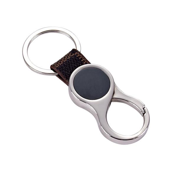 Claves exclusivas con toque de cuero clásico y nombre grabado a medida