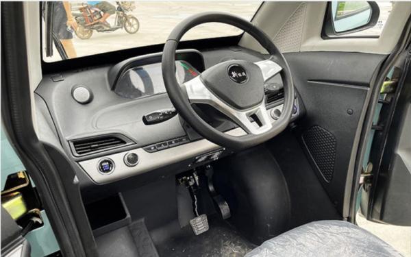 China manufacture cheap price electric car  4 wheels 3 seats new energy electric vehicle with center drive