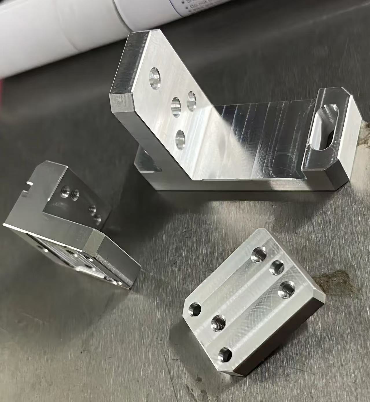 Precision machining of optical equipment components