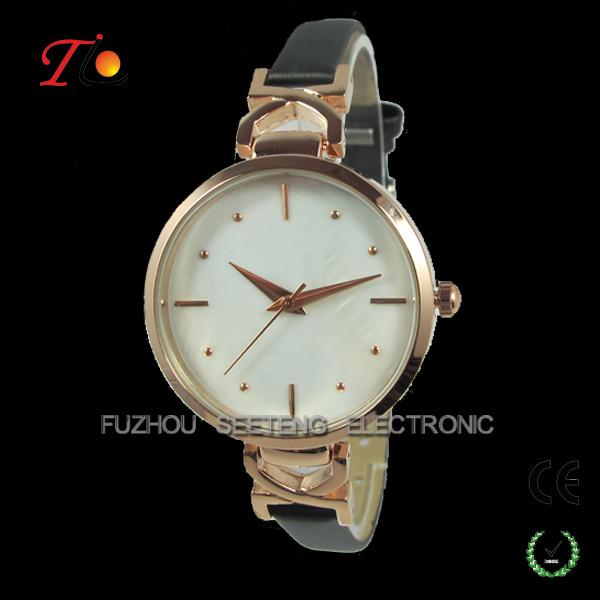 Beautiful thin gold color lady wrist watch with shell dial face