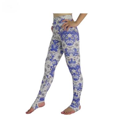 As calças sem emenda as mais atrasadas da ioga dos testes padrões de flor da roupa do desgaste da ioga dos produtos
