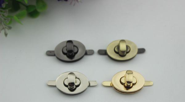 China handbag hardware silver color oval shape small twist turn lock