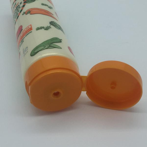 Белая косметическая мягкая пластиковая трубка лосьона тела ярлыка трубки с крышкой сальто верхней