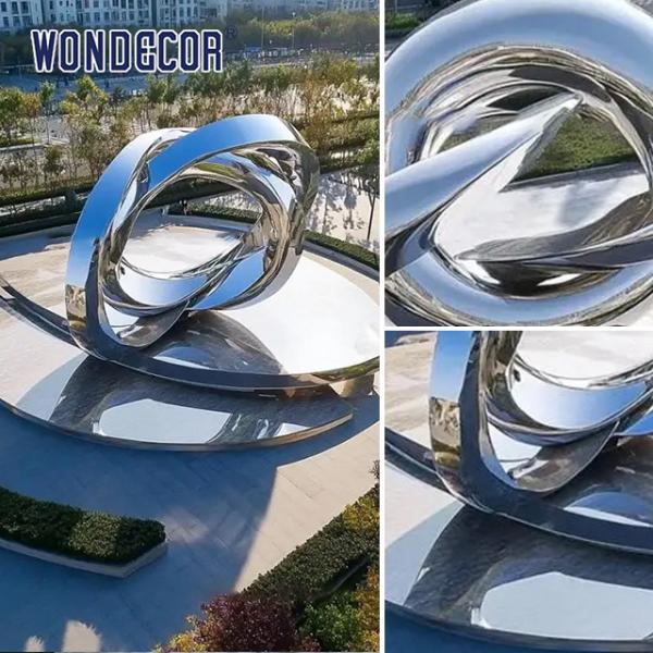 Абстрактная скульптура кольца из нержавеющей стали современной городской уличной архитектуры